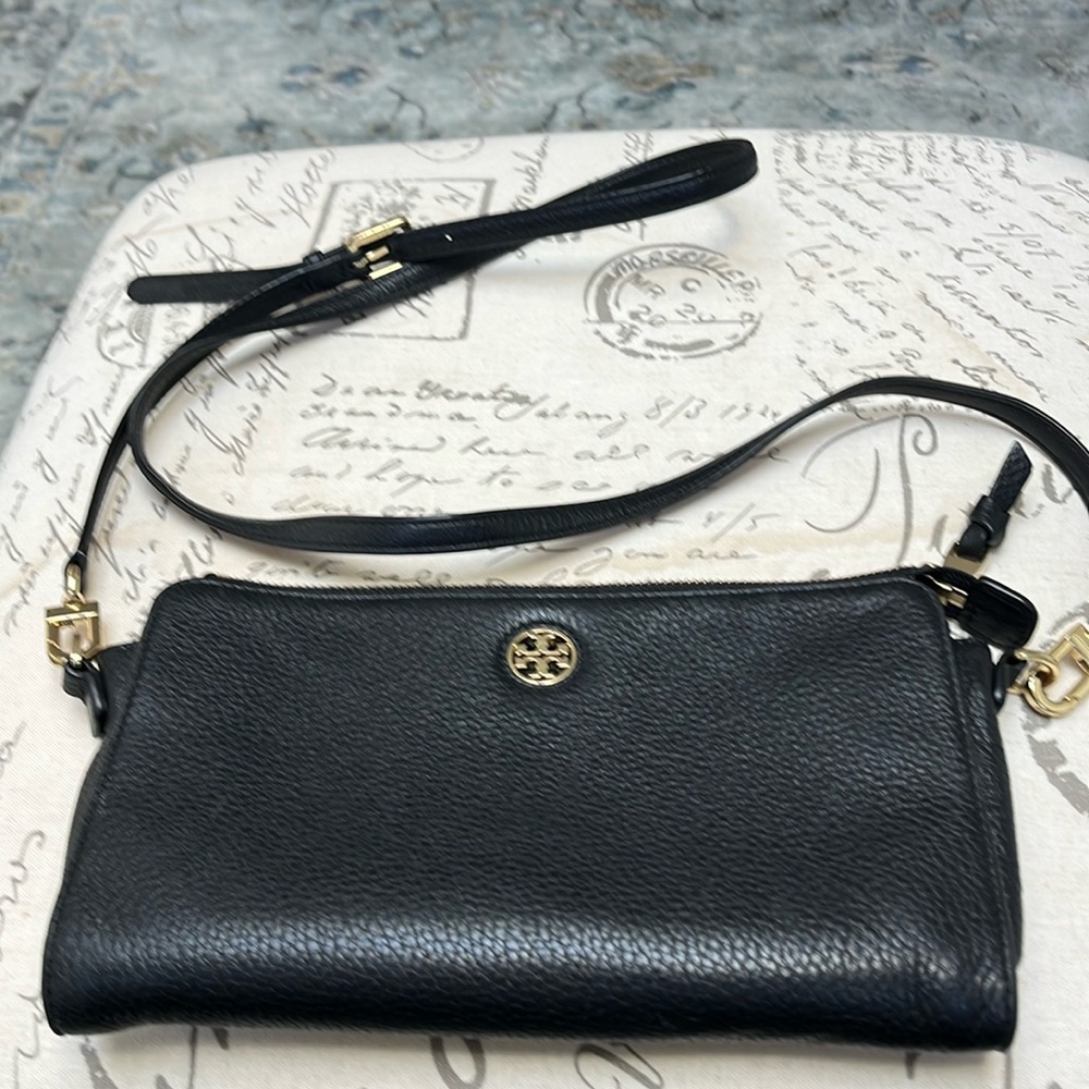 Tory Burch Black tumbled leather crossbody bag.